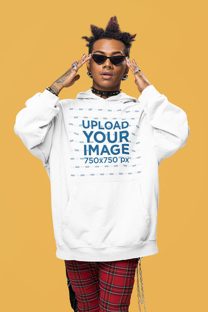 Alternative-Inspired Mockup of a Man Wearing Sunglasses and an Oversized Hoodie