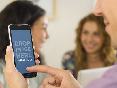 Galaxy S5 Mockup Featuring Man Browsing Through His Phone