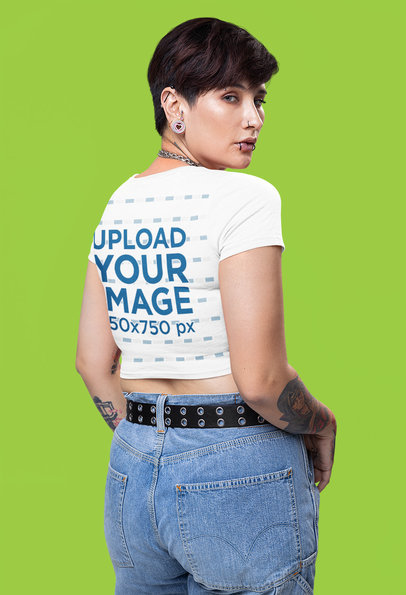 Back-View Mockup of a Woman with Arm Tattoos Wearing a Bella Canvas Crop Top  m31649