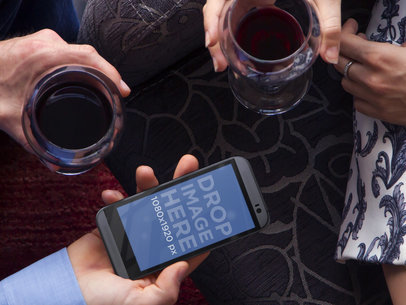 HTC Mockup of Couple Drinking Wine on a Date