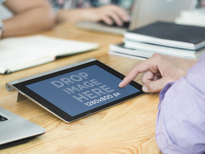 Man Using Lenovo Tablet Mockup at Creative Office Workspace