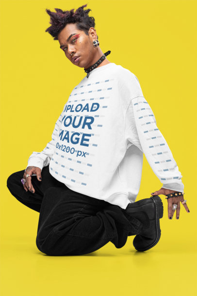 Sweatshirt Mockup Featuring a Man Posing in an Alternative-Inspired Outfit