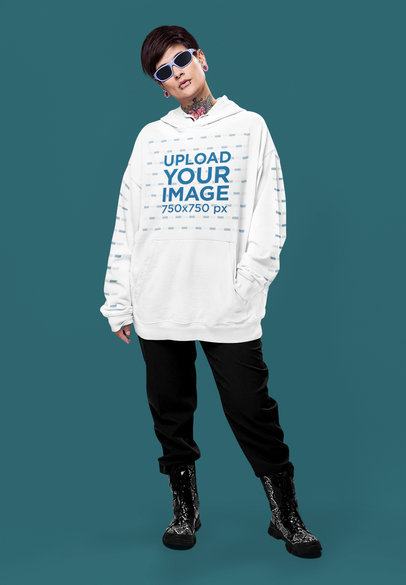 Pullover Hoodie Mockup Featuring a Tattooed Woman With an Alternative Fashion Style