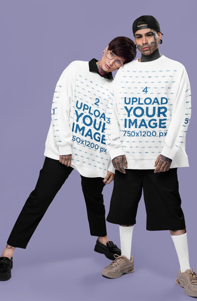 Oversized Sweatshirt Mockup of a Tattooed Man and a Woman With Serious Looks