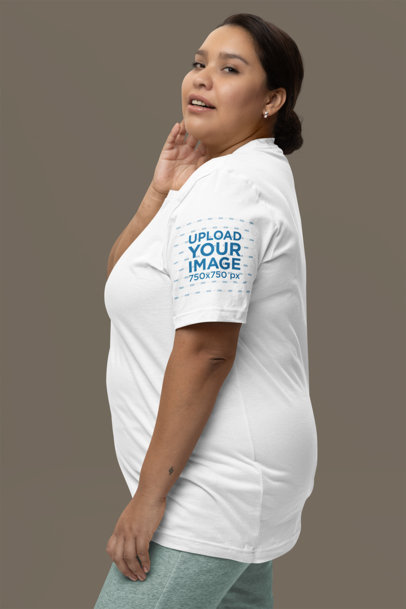 Mockup of a Woman Wearing a Bella Canvas T-Shirt with a Customizable Short Sleeve