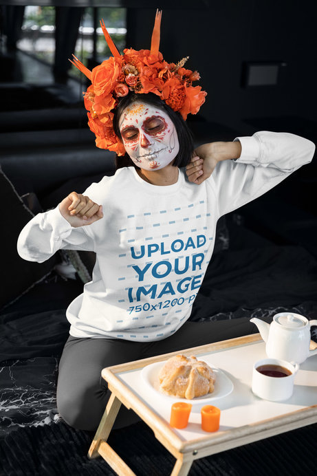 Sweatshirt Mockup of a Woman in a Catrina Costume with Decorative Flowers on Her Head