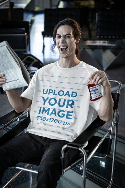 Halloween-Themed Stanley Stella Tee Mockup of a Vampire Drinking Fake Blood m35479