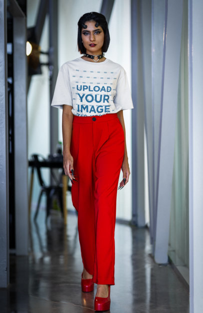 Halloween-Themed Mockup of a Woman with Devil Horns Wearing an Oversized Stanley Stella Tee  m35483