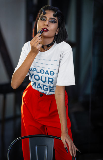 Stanley Stella Tee Mockup of a Woman with Devil Horns Putting on Her Lipstick m35482