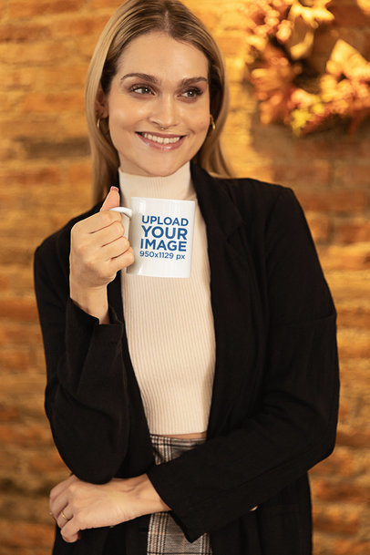 Thanksgiving-Themed Mockup Featuring a Woman Holding an 11 oz Coffee Mug