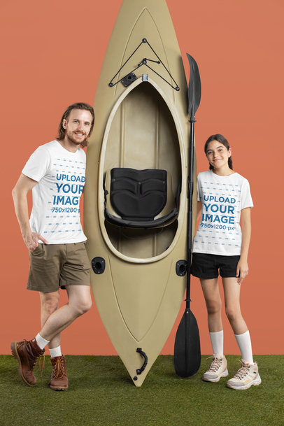 T-Shirt Mockup of a Father and His Daughter Posing with a Kayak