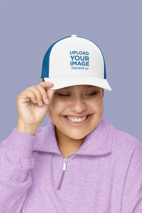 Yupoong Trucker Hat Mockup Featuring a Cheerful Woman in a Studio