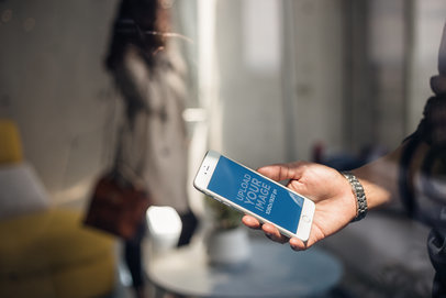 Silver iPhone 8 Plus Mockup of a Man with a Wristwatch Using an App a21276