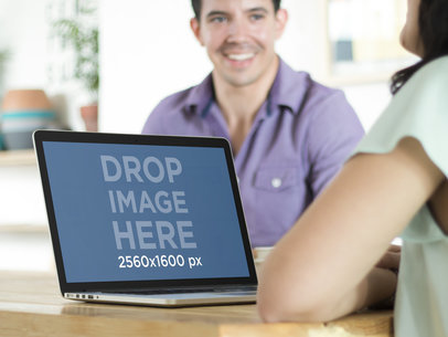 Macbook Pro Mockup Featuring a Creative Office Setting