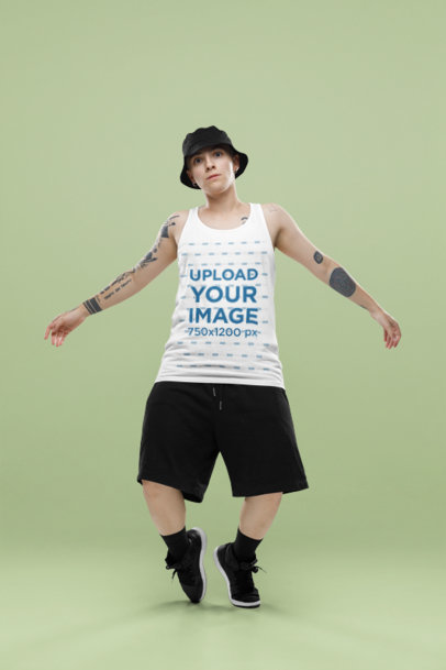 Bella Canvas Tank Top Mockup of a Tattooed Woman Dancing in a Studio