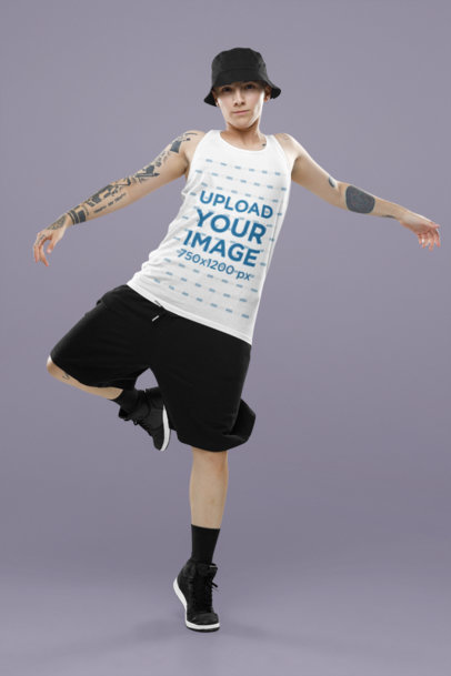 Bella Canvas Tank Top Mockup of a Tattooed Woman Dancing in a Studio