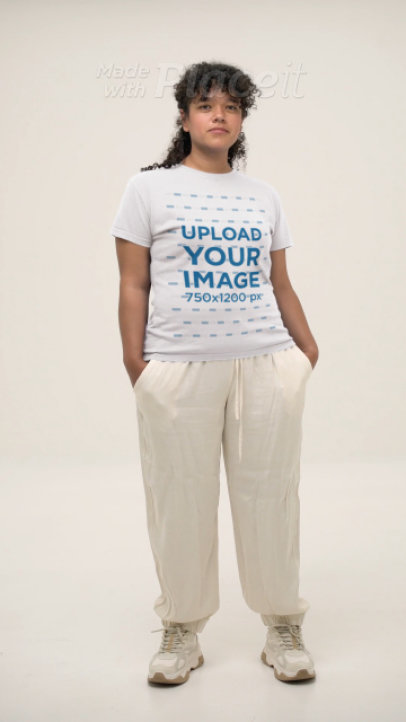 Bella Canvas T-Shirt Video Featuring a Curly-Haired Woman in a Studio