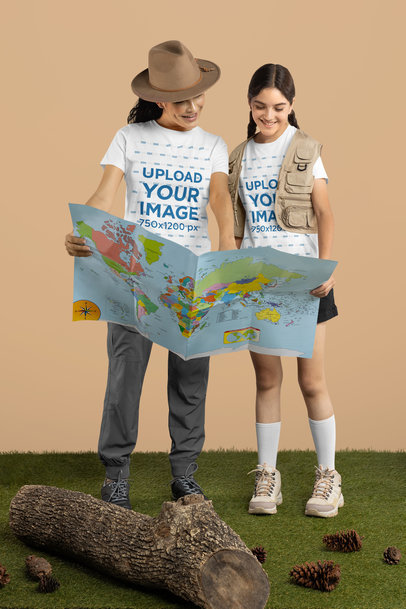 T-Shirt Mockup of a Mother and Her Daughter Dressed as Explorers While Using a Map m34970