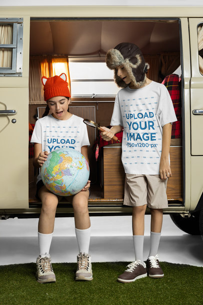 T-Shirt Mockup of Two Siblings in a Camper Van Holding a Globe