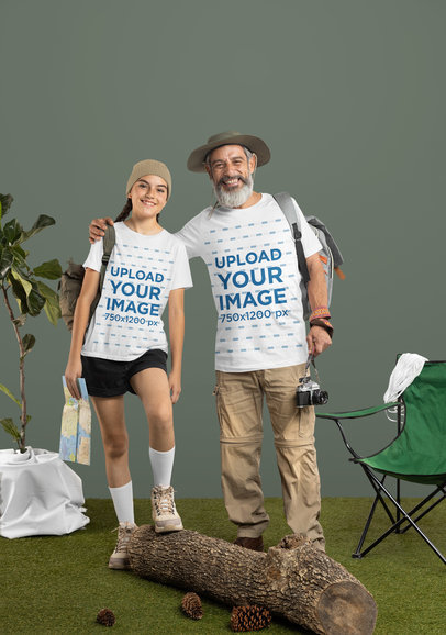 Bella Canvas T-Shirt Mockup of a  Happy Girl and a Senior Man Posing in a Camping-Themed Setting