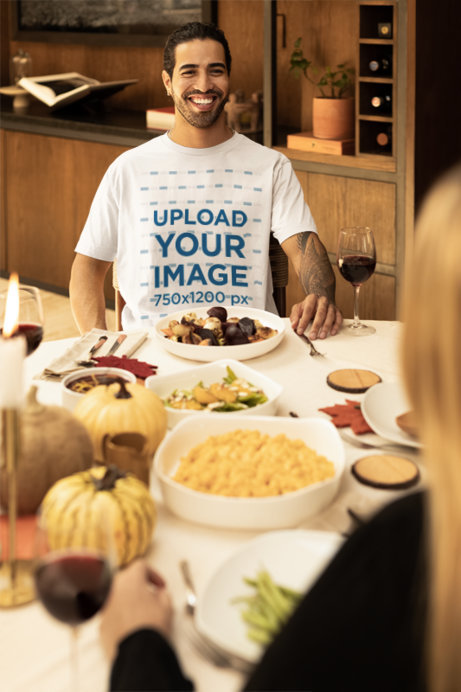 Stanley Stella T-Shirt Mockup of a Happy Bearded Man in a Thanksgiving Dinner
