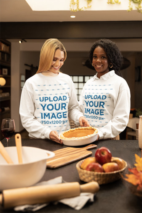 Gildan Sweatshirt Mockup Featuring Two Happy Women With a Thanksgiving Pie