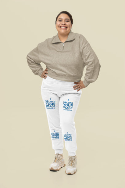 Mockup of a Cheerful Woman Wearing Cotton Heritage Sweatpants