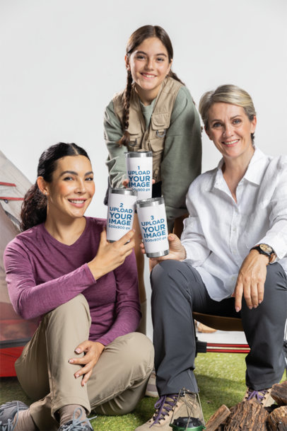 Mockup of a Happy Family Holding Travel Mugs