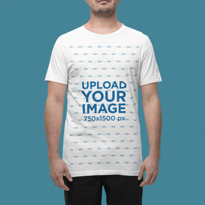 Mockup of a Man Wearing a Bella Canvas Crewneck T-Shirt in a Studio