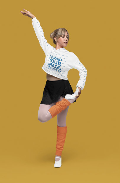 Crop Top Hoodie Mockup of a Professional Ballerina Dancing in a Studio
