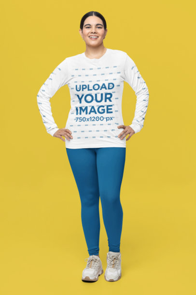Mockup of a Happy Woman Wearing a Round-Neck Bella Canvas Long Sleeve T-Shirt