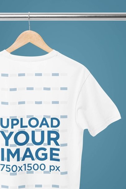 Mockup of a Crewneck Next Level T-Shirt Hanging From a Steel Bar