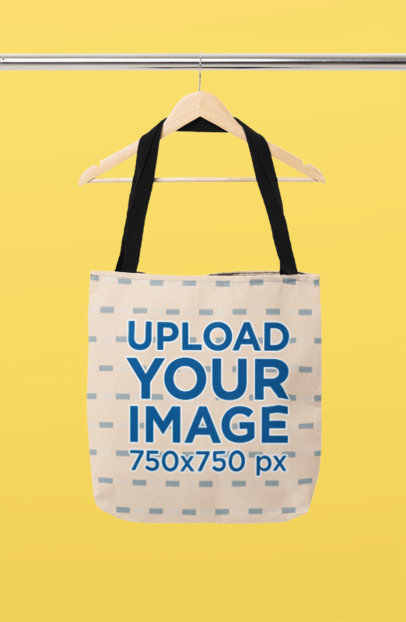 Mockup of a Sublimated Tote Bag Placed on a Wooden Hanger