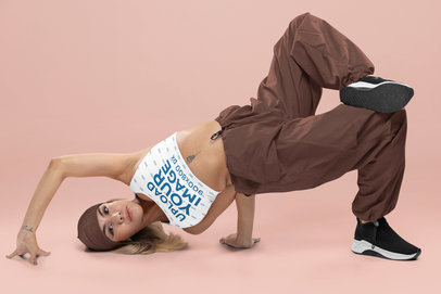 Sports Bra Mockup of a Professional Breakdancer Woman Posing in a Studio m33986