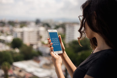 Silver iPhone 8 Mockup of a Woman at a Rooftop a21275
