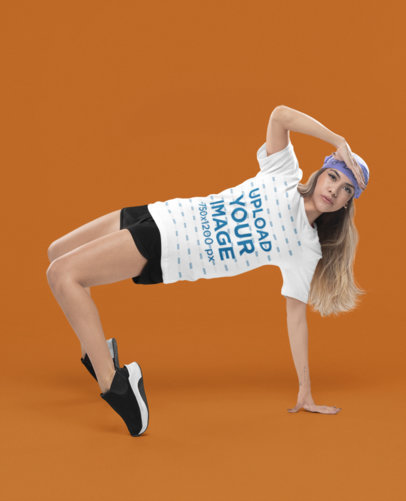 Bella Canvas T-Shirt Mockup of a Serious Woman Dancing Hip Hop Against a Customizable Background