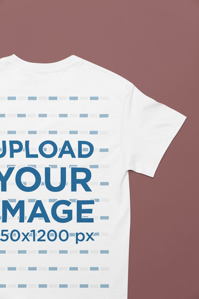 Mockup of a Gildan Tee Placed Upside Down over a Solid Background