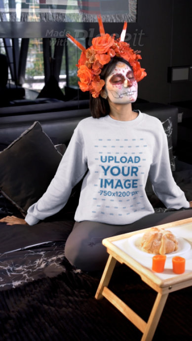 Dia de Muertos-Themed Video Featuring a Woman Wearing a Gildan Sweatshirt