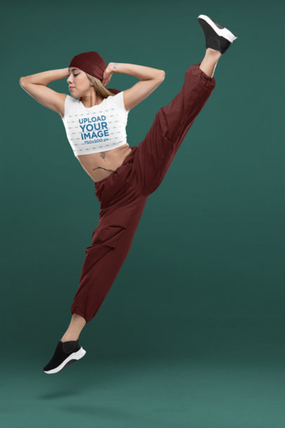 Bella Canvas Crop Top Mockup Featuring a Female Dancer Making a Jump m33997