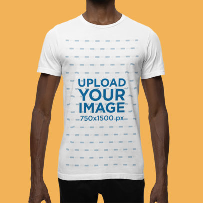 Mockup of a Man Wearing a Rounded-Neck Bella Canvas T-Shirt in a Studio