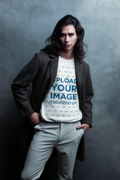 Gildan Sweatshirt Mockup Featuring a Serious Man With Long Hair Posing in a Studio