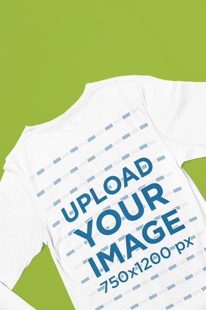 Mockup of a Bella Canvas Long Sleeve T-Shirt Placed Upside Down over a Solid Surface