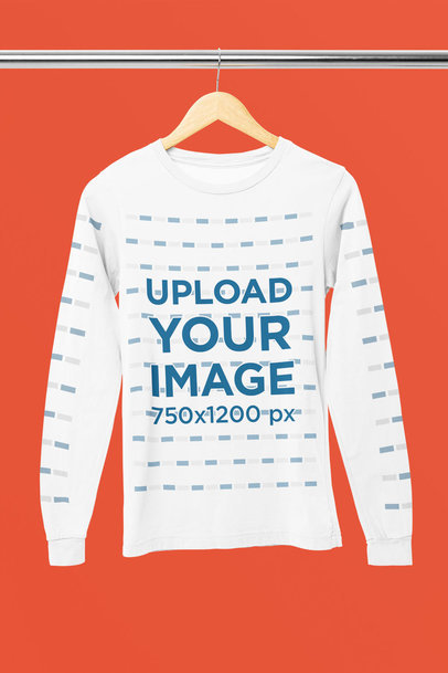 Mockup of a Bella Canvas Long-Sleeve Tee Placed on a Wooden Hanger