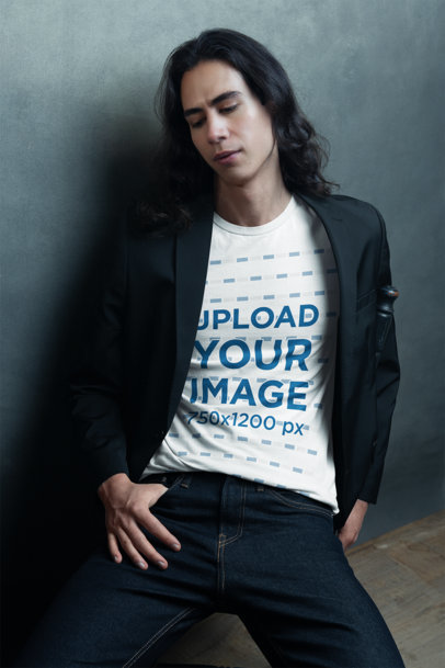 Bella Canvas T-Shirt Mockup Featuring a Long-Haired Man Posing for an Editorial Photoshoot