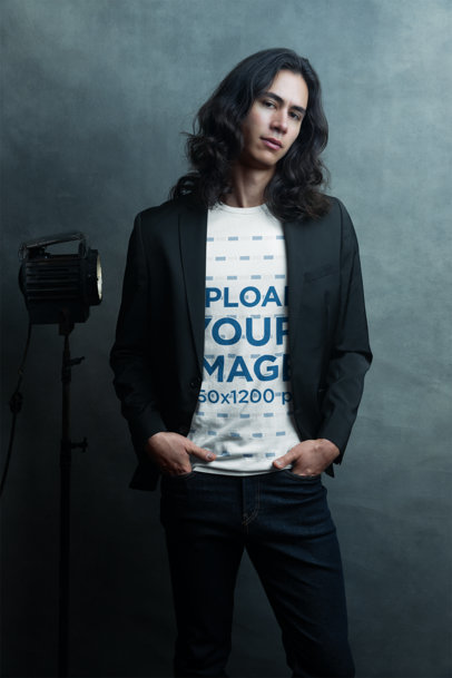 Bella Canvas T-Shirt Mockup Featuring a Long-Haired Man Posing for an Editorial Shoot
