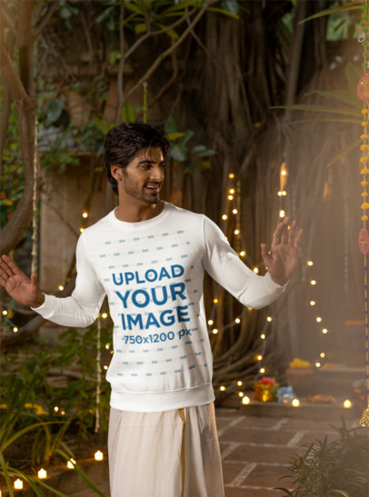 Sweatshirt Mockup of a Bearded Man Posing in a Diwali-Decorated Garden m35980