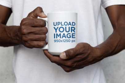 Closeup Mockup of a Man Holding a 15 oz Coffee Mug  m35753