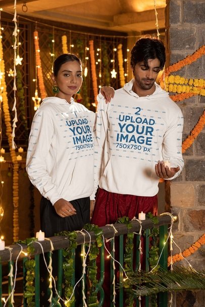Diwali-Themed Mockup of a Man and Woman Wearing Gildan Pullover Hoodies