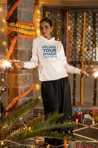 Diwali-Themed Crewneck Sweatshirt Mockup of a Woman Holding Two Sparklers m35957