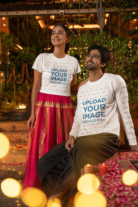 Crop Top and Sweatshirt Mockup of a Smiling Couple Posing in a Diwali-Decorated Setting